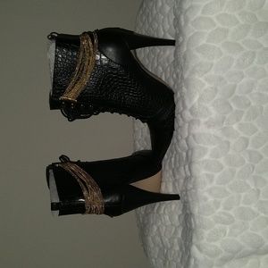 Black leather alligator printed High Heel Booties with draped gold chains!